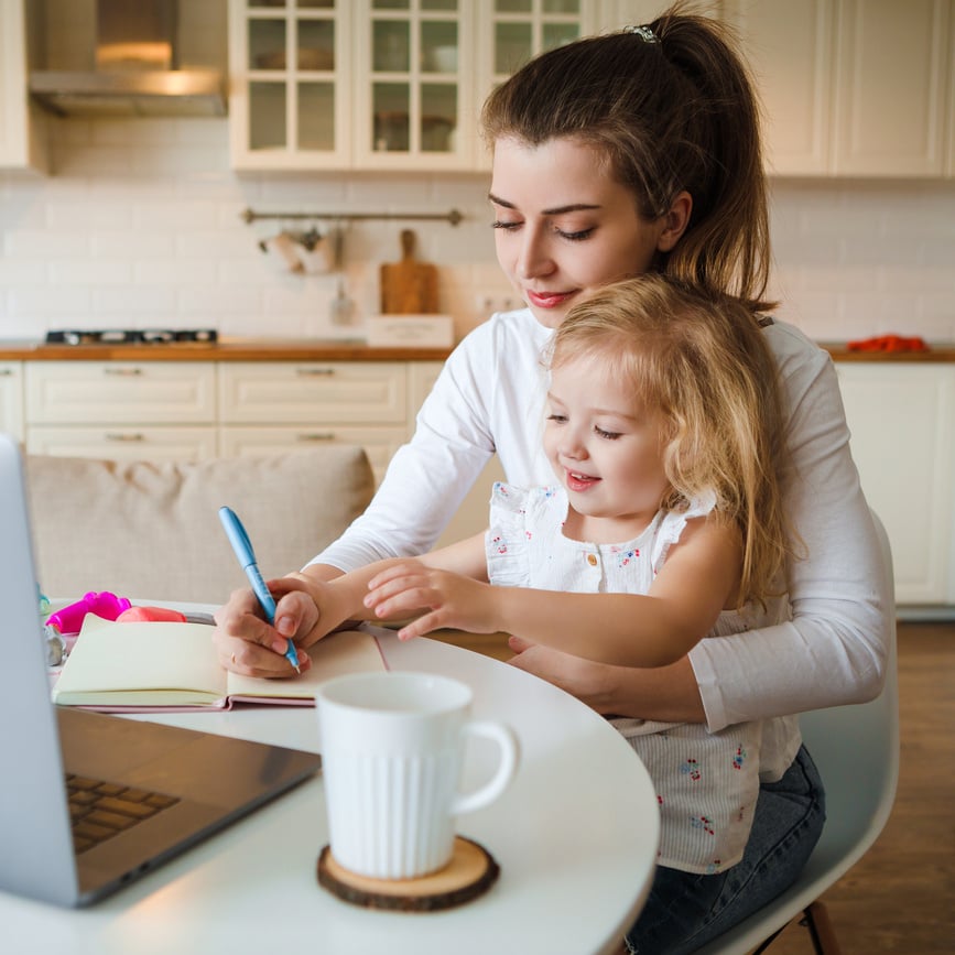 Work at home during quarantine. Mom with a child.