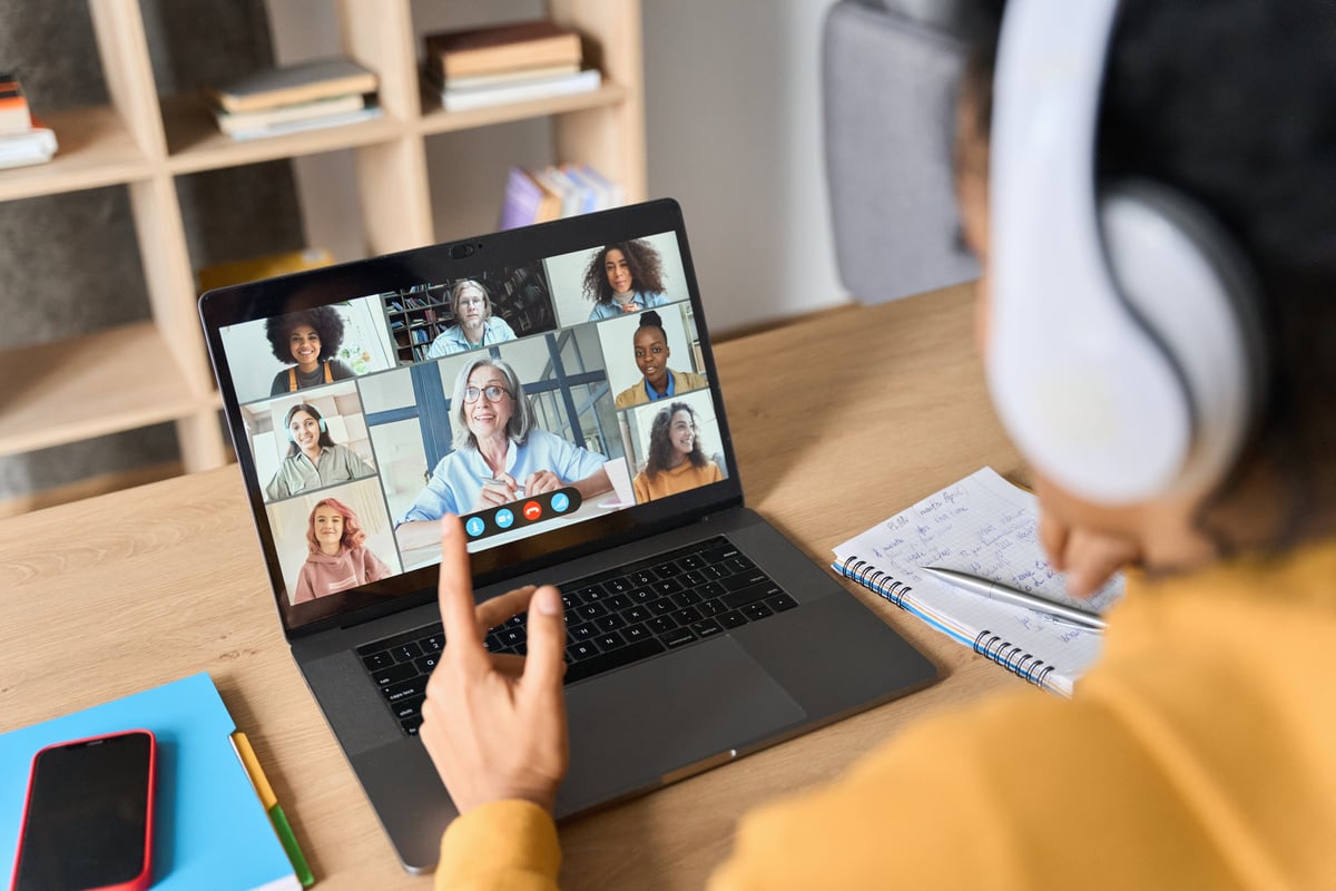 Person Having an Online Meeting with Colleagues